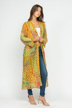 20% Cotton 80% Rayon One Size fits most Side Pockets Measurement Guide One Size- Bust 48" Length 51" Bohemian Patterned Kimono With Vibrant Print, Multicolor Printed Long Sleeve Kimono, Summer Layering, Bohemian One-size Floral Print Kimono, Multicolor Cotton V-neck Kimono, Multicolor Floral Print V-neck Kimono, Kimono Jacket, Overall Dress, Trinidad And Tobago