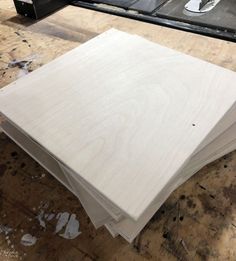 several pieces of plywood are stacked on top of each other