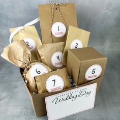 a box filled with lots of brown paper bags and numbers on top of each one