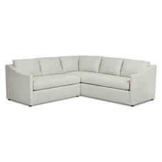 a white sectional couch on a white background