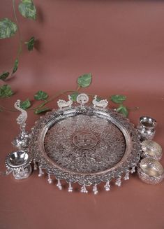 Size : 13inch Weight- 1200gm approx. Indian Pooja thali,Raddha krishna garba naxithali, German SilverTraditional Tray For Arti, traditional wedding thali Designer Pooja Thali, Material:- German Silver ,  Colour:-Silver, ❥ Product Details: German Silver washable Designer Pooja thali and other items for Diwali Puja, Navaratri, Ganesh Utsva, Puja Decor, Weddings, Satyanarayana Vratam These items have antique elegant design that gives addition to you Home decor or can be use for the decoration of Restaurants, Bars. On the occasion of diwali, christmas, anniversary, birthdays these items can be readily turned into a wonderful gift item Spiritual Lucky Gift, Fengshui Gift, Thanksgiving Gift, Anniversary Gift, Easter Gift, Birthday Gift, Wedding gift. Why choose us? 1. We take pride in providing Wedding Thali, Puja Decor, Diwali Puja, Pooja Thali, Lucky Gifts, Embossed Design, German Silver, Traditional Indian, Thanksgiving Gifts