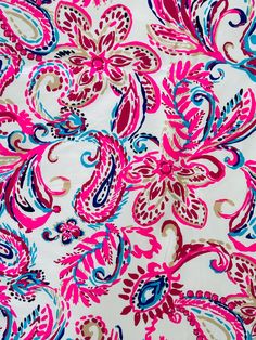 a pink and blue floral print fabric