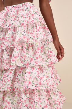 The ethereal elegance that emanates from the Sister Jane Wild Hearts Ivory Multi Floral Tiered Midi Skirt will have you feeling romantic all day long! A darling pink and green floral print, along with a subtle diamond-like jacquard pattern, adorns gauzy woven chiffon as it shapes this whimsical midi skirt. The high-waisted fit naturally flatters your figure, while layers of cascading tiers (with hidden tulle for additional volume) line the A-line silhouette to complete the adorable design. Hidde Floral Print Flowy Skirt For Garden Party, Feminine White Ruffled Maxi Skirt, Feminine White Maxi Skirt With Ruffles, Tiered Skirt Dress With Lined Skirt For Brunch, Feminine Spring Dresses With Lined Skirt, Pink Full Skirt Feminine Dress, Pink Dress With Ruffle Hem And Voluminous Skirt, Spring Wedding Maxi Skirt With Ruffles, Feminine Pink Dress With Voluminous Skirt