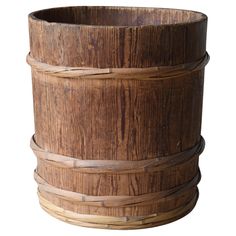 a large wooden basket with four sections on each side and two sides at the top