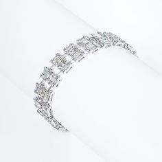 Myla 14 Carats Combined Mixed Shape Diamond Double Row Bracelet in 14k White Gold Style: Diamond Double Row BraceletDiamondsDiamond Size: 14.25 Carats Diamond Shape: Combine Mixed Shape (CMB)SettingMetal: 14K White GoldMetal Weight: 30.00 GramsClasp: Box catch with hidden safetyTotal Carat Weight: 14.25 Carats Gold Style, Diamond Shapes, The Row, White Gold