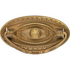 an ornate brass door handle on a white background