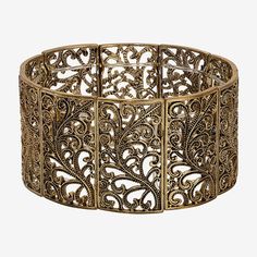 Add a statement to your wardrobe with this beautifully designed 1928 bracelet. A stunning wide and elegant filigree design stretch bracelet, hugs the wrist perfectly while its smooth polished frame gives it a modern appeal.Circumference: 7 InchMetal Color: Gold ToneCare: Wipe CleanBracelet Type: Stretch BraceletsMetal: BrassIs Beaded: NoCountry of Origin: Imported Elegant Antique Gold Metal Bracelets, Elegant Antique Gold Metal Bracelet, Elegant Antique Gold Bangle, Elegant Antique Gold Bracelet With Intricate Design, Refined Fashion, 1928 Jewelry, Filigree Jewelry, Filigree Design, Stretch Bracelet