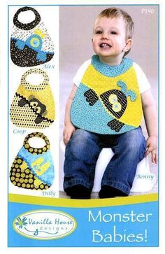 a baby wearing a bib with the words monster babies written in blue and yellow