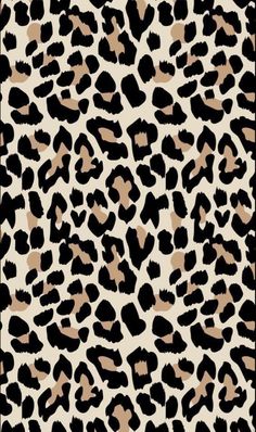 an animal print background with black and brown spots