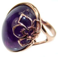 Handmade Unique 925 Sterling Silver ring with unique one of a kind Amethyst,  10.90 grams of marvelous handcrafted jewelry design. Only one piece availble ready to ship! It's unique worldwide ring - simply piece of art in world of fine jewelry. Purple Beauty 10.5 carat  Amethyst 18K Rose Gold over  .925 Sterling Silver Ring size 8 3/4  RING DETAILS: Weight: 10.90g; Size: 8 3/4; Material: Sterling Silver; Main stone: Amethyst; Dimension: L - 7/8, W - 3/4, T - 3/8 inch; Stamp / Mark: 925; Conditio Luxury Antique Amethyst Ring For Women, Luxury Rose Gold Amethyst Ring As Gift, Elegant Amethyst Ring With Polished Finish, Luxury Polished Amethyst Ring Gift, Exquisite Amethyst Ring As Gift, Exquisite Amethyst Ring Gift, Elegant Hallmarked Amethyst Ring As Gift, Fine Jewelry Amethyst Ring With Polished Finish As Gift, Unique Oval Amethyst Cabochon Ring