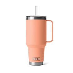 the yeti travel mug is shown in peach