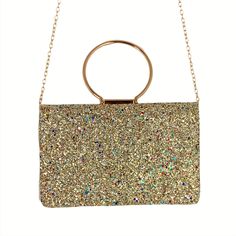 Alessia Gold Multi Glitter Crossbody Purse Evening Clutch Bag Party Metal Chain Hoop Handle This fabulous bag features sparkly gold and silver glitter with different colored specks throughout. Dainty gold tone metal crossbody chain and metal hoop handle on top. Chain can be removed or simply tucked inside. Flap with snap closure. Interior slip pocket. Perfect fun bag ready for any party or holiday. Measures approximately 5.75" tall x 8.75" long x 3" depth; handle drop 3.5"; strap drop 21". Metallic Party, Evening Clutch Bag, Evening Clutch, Silver Glitter, Crossbody Purse, Fun Bags, Gold Tone Metal, Metal Chain, Purses Crossbody