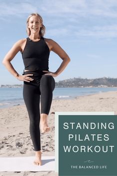 a woman standing on a yoga mat with the words standing pilates workout in front of her