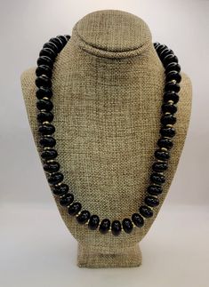 NAPIER Vintage Black Plastic Beaded Necklace - Lovely Versatile Necklace with Black and Gold Tone Beads - Gift for Mom - Work Jewelry-K#1149 - Black plastic and gold tone costume metal beads - 24 inch necklace  - 1/2" width of black beads - Signed on rear of clasp - Clean and in good condition Formal Black Jewelry With Large Beads, Black Oval Beaded Necklaces, Formal Black Necklace With Large Beads, Black Beaded Jewelry With Oval Beads, Black Round Jewelry With Large Beads, Black Formal Necklace With Round Beads, Handmade Black Onyx Beaded Necklaces, Handmade Black Onyx Beads, Black Beaded Necklace With Large Beads For Formal Occasions