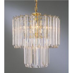 a chandelier hanging from the ceiling with clear glass beads and gold trimmings