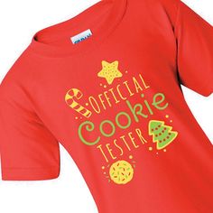 It's a tough job, but someone has to do it! This cute Christmas shirt for kids designates them the official cookie tester, so prepare for the sugar rush! Durable and comfortable, they'll love to wear this holiday shirt at family Christmas celebrations, holiday parties or even to school to show off this cool tee to their classmates. Features designs of the classic cut-out Christmas cookie shapes! © OTC

o Brand: Gildan
o Short sleeve
o 100% preshrunk cotton, 5.3 oz. 
o Seamless double needle coll Official Cookie Tester, Cookie Shapes, Granny Christmas, Best Ugly Christmas Sweater, Cute Christmas Shirt, Christmas Tee Shirts, Christmas Shirts For Kids, Kids Christmas Outfits, Cute Christmas Shirts