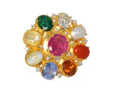 This stunning 14K gold Navratna ring is our effort to bring a new facet of modernism to traditional Indian designs. This ring contains a center flower beholding all nine precious natural gemstones which include Ruby, Yellow Sapphire, Rose Cut Diamond, Emerald, Pearl, Coral, Blue Sapphire, Hessonite Garnet (Gomed) and Cats Eye surrounded by full cut diamond setting at the borders. The centre ruby is a natural Burmese ruby weighing 2.18ct which is surrounded by other natural precious gemstones accompanied with natural diamond solitaire of 0.70ct. All gemstones are kept open at back which can be seen to admire the beauty of each gemstone and perfect for the wearer as according to Hindu mythology it is considered very auspicious to wear Navratna. Navratan Ring, Navratna Ring, Indian Designs, Burmese Ruby, Hessonite Garnet, Cats Eye, Diamond Settings, Coral Blue, Yellow Sapphire