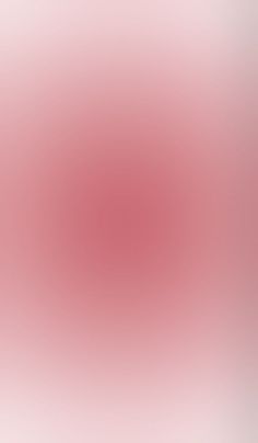 a blurry image of pink and white colors