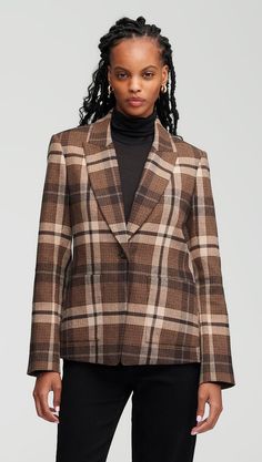 Made of elegant Italian wool plaid, this sophisticated blazer features traditional suiting details like a single button closure, a peak label, and exterior patch pockets. Convey an air of elevated academia in your wardrobe with this outerwear piece, which can be styled with a white button-up and jeans or a turtleneck and trousers. Classic Single-breasted Plaid Blazer, Vintage Plaid Wool Blazer, Plaid Single-breasted Long Sleeve Blazer, Double-breasted Plaid Blazer With Double Button Closure, Luxury Single-breasted Plaid Blazer, Women's Blazers, Lapel Blazer, White Button Up, Brown Plaid