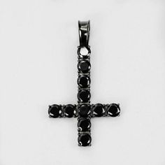 Gorgeous Mens upside down Cross on tennis chain.
Man made black diamonds
Oxidized solid 925 sterling silver! Will NEVER tarnish or change colors
Chain is 4mm wide and we have all lengths from 18-30"
Chain weighs 40-70 grams depending on length an is 70-100 carats 
Pendant is about 6 grams and has 10 carats...measures 1" by 1.75"
This is truly a stunning piece and can be worn as a short choker or a longer chain!
This would also look dope as a combo with a Black Round Jewelry For Streetwear, Upside Down Cross Jewelry, Black Cross Jewelry For Streetwear, Black Diamond Cross Necklace, Punk Style Black Cross Necklace, Gothic Cross Necklace With Adjustable Chain, Silver Gothic Cross Necklace With Adjustable Chain, Upside Down Cross, 10k Gold Chain