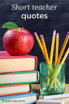 an apple sitting on top of a stack of books with pencils next to it