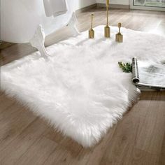 a white rug on the floor in a living room