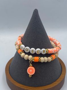 Stretchy Heishi and wood beads bracelet set. Great for orange lovers Orange Bohemian Beaded Bracelets With Letter Beads, Bohemian Orange Beaded Bracelets With Letter Beads, Orange Bracelets With Wooden Round Beads, Orange Wooden Beads Bracelet As Gift, Orange Wooden Beads Bracelet For Gift, Orange Wooden Beaded Bracelets As Gift, Gift Orange Wooden Beaded Bracelets, Mini Chips, Larimar Necklace