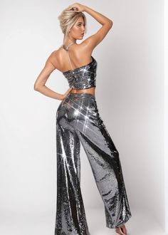 This captivating two-piece set is perfect for your evening outings. The strapless top and flared pants are both lavishly sequined in a timeless silver hue. This glamorous set will have you radiating luxury and elegance. Fit Type: Regular Fit Fabric: non-Stretch Material: Polyester Fiber Glamorous Strapless Jumpsuit For Prom, Glamorous Fitted Strapless Jumpsuit For Prom, Glamorous Sparkling Party Pants, Sequined Bottoms For Prom And Party Season, Glamorous Silver Fitted Sets, Glamorous Sequined Bottoms For Gala, Glamorous Sequin Gala Bottoms, Glamorous Strapless Sequin Jumpsuit For Night Out, Shimmer Evening Pants For Party Season