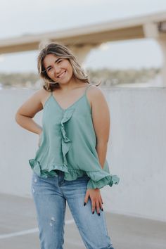 Ruffled tank top with adjustable straps. Eliza is wearing a size medium Lightweight Rayon This item is final sale. Green Camisole With Tank Straps For Spring, Green Tank Strap Camisole For Spring, Flowy Spring Camisole, Spring Tank Top With Ruffled Straps For Day Out, Spring Tank Top With Adjustable Straps For Brunch, Spring Tank Top With Ruffled Straps, Ruffled Tank Top With Tank Straps For Spring, Spring Tank Top With Spaghetti Straps And Ruffles, Casual Flowy Spaghetti Strap Top