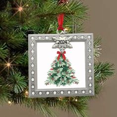 a christmas ornament hanging from a tree