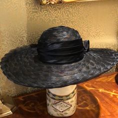 This Is A Lovely Intricate Weaved Large Brim Black Straw Vintage Hat With A Large Ruffled Straw Bow Trimmed With Satin And Black Feathers. The Designer Is Toucan Collection New York. This Beautiful Hat Is In Pristine Condition. Black Formal Straw Hat With Flat Brim, Formal Black Straw Hat With Flat Brim, Black Straw Hat With Curved Brim For Evening, Elegant Black Brimmed Straw Hat, Formal Black Straw Hat, Black Wide Brim Straw Hat For Evening, Vintage Hat, Black Feathers, Beautiful Hats