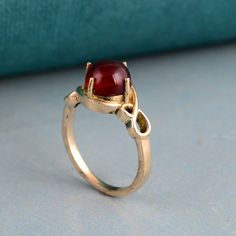 Garnet Ring, Handmade Ring, Unique Ring, Vintage Ring, Women Ring, Promise Ring,Boho Ring, Deco Ring, Anniversary Ring, Statement Ring, Gift Ring, Gifts For Her SIZE :- All Size Are Available. US1 TO US16, If Your Size Not  Listed Feel Free to Contact us METAL :- Brass STONE;- Garnet We Crafted These in 100% Solid Silver and Brass These Simple rings are perfect for any occasion. ~ Make a Statement with these minimal yet simple Unique Rings. Ring can be customized on request and gemstone can be made to any gemstone you want. Same Design Ring Are Upload With Any Gemstone. Please Visit Our Shop to View Complete Collection. If You Need Faster Shipping, Please Contact us Please Make Sure to Include The Correct Address During Before Order. You Can return Item within 10 Days After Successful Deli Vintage Metal Crystal Promise Ring, Bohemian Metal Midi Rings For Weddings, Vintage Metal Midi Rings As Gift, Handmade Vintage Midi Rings For Gifts, Vintage Handmade Midi Rings For Gifts, Vintage Handmade Midi Rings As Gift, Bohemian Metal Crystal Promise Ring, Vintage Handmade Crystal Toe Ring, Adjustable Vintage Midi Rings For Wedding