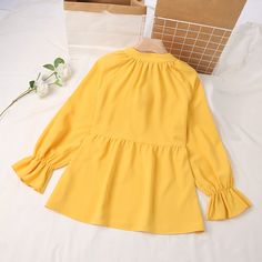 Women's Lace up V-neck Ruffle Long Sleeved Casual Shirt Blouse Spring V-neck Peplum Top With Ruffle Hem, Fall V-neck Top With Ruffle Hem, Feminine V-neck Top With Ruffle Hem, Feminine Yellow V-neck Blouse, Fall V-neck Ruffled Tops, V-neck Ruffled Blouse For Work, V-neck Ruffles Blouse For Work, V-neck Ruffle Blouse For Work, Spring V-neck Blouse With Ruffle Hem