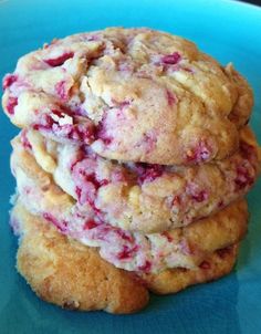 three cookies stacked on top of each other with cranberry sauce in the middle