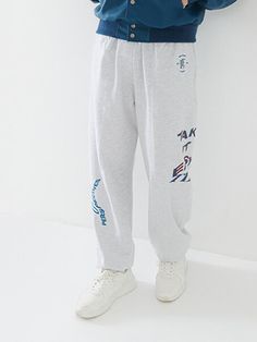 Editor's NotesOversized jogger pants with a unique block lining. These feature a TLES graphic artwork on the legs. Wear yours as a set-up with jogger pants or with other pants or bottoms. - Oversized fit- Block line detail- Relaxed silhouette- Ribbed edges- Graphic artwork printedMeasurements(in.)Size: M / LLength: 40.9 / 43.3 in.Waist: 11.8 / 12.6 in.Thigh: 13 / 14.2 in.Rise: 14.2 / 14.2 in.Hem: 4.3 / 4.3 in. *Model info(men): Height 6' 14 / Fitting size L*Model info(women): Height 5' Athleisure Joggers With Letter Print, Sporty Graphic Print Sweatpants For Spring, Graphic Print Cotton Athleisure Bottoms, Athleisure Cotton Bottoms With Graphic Print, Cotton Athleisure Bottoms With Graphic Print, Jogging Joggers With Letter Print, Letter Print Joggers For Jogging, Sporty Relaxed Fit Pants With Graphic Print, Spring Cotton Sweatpants With Graphic Print