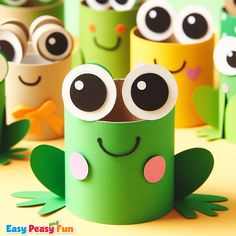 paper roll crafts with faces and eyes on them