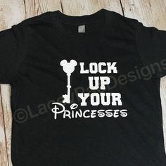 Lock up your princesses youth triblend tee, crew neck , color options, boys tee, Disney shirt,  Boys disney shirt Black Themed T-shirt For Disney Fan Events, Themed Black T-shirt For Disney Fan Events, Boy Disney Shirts, Disney 2023, Rhinestone Projects, Family Disney Trip, Diy Disney Shirts, Disney World Shirts, Lock Up