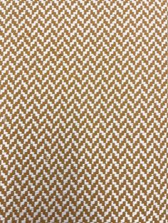 a brown and white pattern on fabric