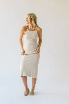 Embrace effortless style with The Aplin Ribbed Tank Midi Dress in Natural. Made with soft ribbed fabric, this dress offers all-day comfort and features a flattering midi length. Perfect for any occasion, this dress is a must-have for your wardrobe. (Score!) Details self/lining: 73% viscose + 27% nylon Fabric Care Guide Here Sizing & Fit Measurements are approximate and taken while laying flat across the front. Not doubled. small: bust = "; waist = "; length = " medium: bust = "; waist = "; length = " large: bust = "; waist = "; length = " Spring Ribbed Midi Length Maxi Dress, Elegant Ribbed Midi Loungewear Dress, Elegant Ribbed Midi Dress For Loungewear, Elegant Ribbed Midi Dress For Day Out, Ribbed Midi Dress For Summer Day Out, Ribbed Midi Dress For A Summer Day Out, Ribbed Beige Dress For Day Out, Beige Ribbed Dresses For Day Out, Beige Ribbed Dress For Day Out