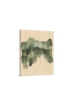 a piece of wood that has been painted with green and white paint on it,