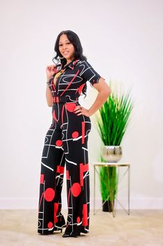 Black V-neck Jumpsuit, Non-stretch V-neck Jumpsuit For Night Out, Casual Printed V-neck Jumpsuits And Rompers, Non-stretch V-neck Jumpsuits And Rompers For Night Out, Red Printed V-neck Jumpsuits And Rompers, V-neck Non-stretch Jumpsuits For Night Out, V-neck Non-stretch Jumpsuits And Rompers For Night Out, Trendy Fitted Jumpsuit With Short Sleeves, Red Printed V-neck Jumpsuit