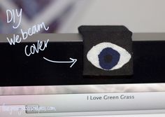 an eye patch is placed on top of a computer keyboard with the words diy webcam cover below it