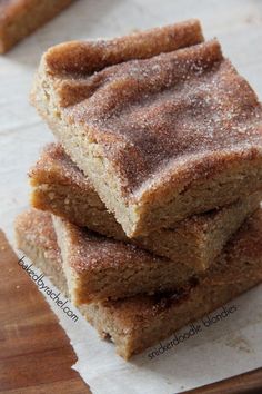 three pieces of cake sitting on top of a piece of paper