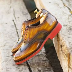 Ambrogio Bespoke Men's Shoes Cognac & Green Patina Leather Brogue Oxfords (AMB2247) Material: Patina Leather Hardware: None Color: Cognac & Green Outer Sole: Rubber Sole Hand-Painted Patina Leather Upper Wingtip Oxfords Design Create using Anticatura Method Zurigo Toe Shape Comes with box and dust bag 100% Handmade in Spain, using only the highest qualities of leathers and other materials 4954-MULTI Exclusive to Ambrogio Collection Note: This is a "Special Order" product, production takes approx Green Patina, Men's Dress Shoes, Leather Brogues, Oxford Shoes Men, Wingtip Oxford, Leather Slip On Shoes, Brogue Shoes, Men's Shoe, Red Sole