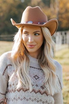 Add a touch of Western flair to your outfit with the Tan Faux Suede Belted Cowboy Hat! Made from faux suede material, this hat features a belted design adorned with an oval coin detail, giving it a unique and stylish edge. The adjustable inner string ensures a secure and comfortable fit, so you can wear it all day with ease. Fall Western Felt Hat For Everyday, Western Style Everyday Felt Hat For Winter, Beige Country Style Felt Hat For Winter, Western Style Fall Hats, One Size Fits Most, Casual Felt Hat For Rodeo, One Size Fits Most, Revival Clothing, Fall Style Guide, Gameday Dress, Casual White Dress