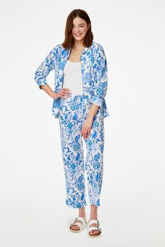 Get comfy for bedtime while looking effortlessly put together for breakfast the next morning in this pajama set. This set includes a long-sleeve button-up pajama top featuring our sophisticated Amanda print and matching pajama bottoms. The lightweight, breathable cotton ensures lasting comfort. 4 Buttons Shirt Pockets Tie Waist Materials and Care 100% 60's Cambric Cotton Machine Wash, Gentle Cycle. Line Dry. Warm Iron If Needed. Made in India Measurement Information Leah is 5'11" and wears size Spring Blue Sleepwear For Loungewear, Blue Spring Sleepwear For Loungewear, Blue Sleepwear For Spring Loungewear, Blue Sleepwear For Spring, Blue Long Pants Sleepwear For Spring, Blue Sets For Spring Daywear, Spring Daywear Sets With Long Pants, Button Up Pajamas, Matching Pajama