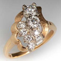 a gold ring with diamonds on it