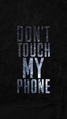 the words don't touch my phone are shown in black and white on a dark background