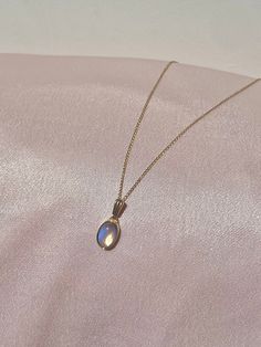 9k yellow gold rainbow moonstone pendant. New production. Each moonstone is natural and one-of-kind and may have natural inclusions. Moonstone: 8 x 6 mm oval cut cabochon Pendant: 18.5 x 7.5 mm Weight: 1.5 grams Pendant only, chain not included. Oval Cabochon Moonstone Jewelry, Dainty Moonstone Jewelry With Cabochon, Oval Moonstone Yellow Gold Jewelry, Yellow Gold Moonstone Jewelry With Oval Shape, Gold Polished Moonstone Jewelry, Gold Moonstone Jewelry With Polished Finish, Oval Moonstone Necklaces With Moon Charm, Yellow Gold Oval Jewelry With Moon Charm, Elegant Moonstone Oval Pendant Jewelry