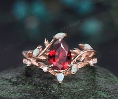 This ring is handmade by myself. The main stone is a 6x8mm pear cut lab ruby. The accent stones are lab opals and moissanites. The band width is about 1.4mm. The material is solid 14k gold(white,yellow,rose gold available) Ring size can be choose from the selection box. Matching band available: https://www.etsy.com/shop/willwork?section_id=20674906 This jewelry can also be made in solid 10k,14k,18k gold,with real diamonds.Contact me! Need rush order? contact me! Need custom making order? Contact Opal Wedding Band, Anniversary Ring Set, Gold Branches, Topaz Birthstone, Bee Ring, Ruby Engagement Ring, Unique Gemstones, Matching Band, Red Ruby